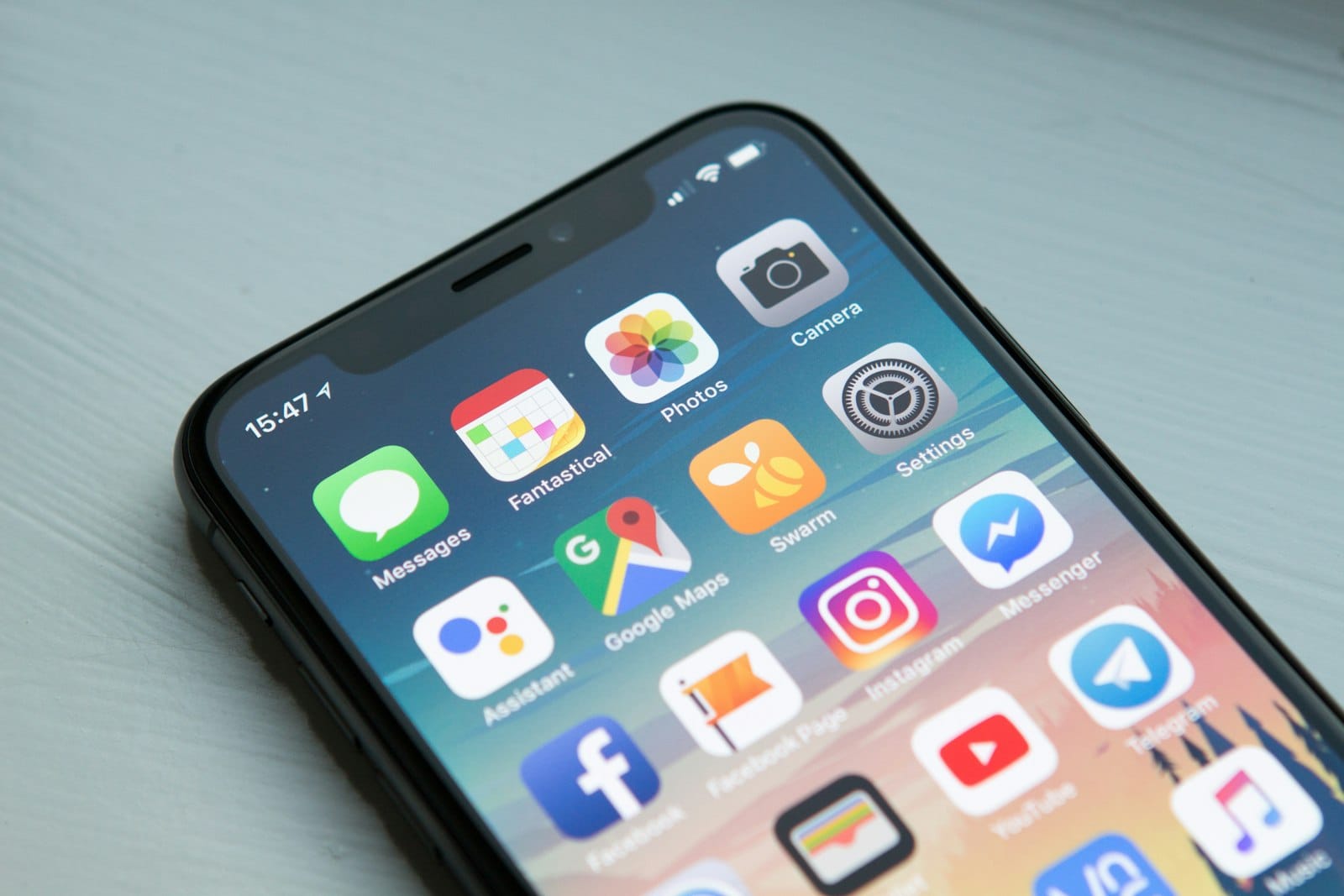A phone on a desk, ready for a quick search