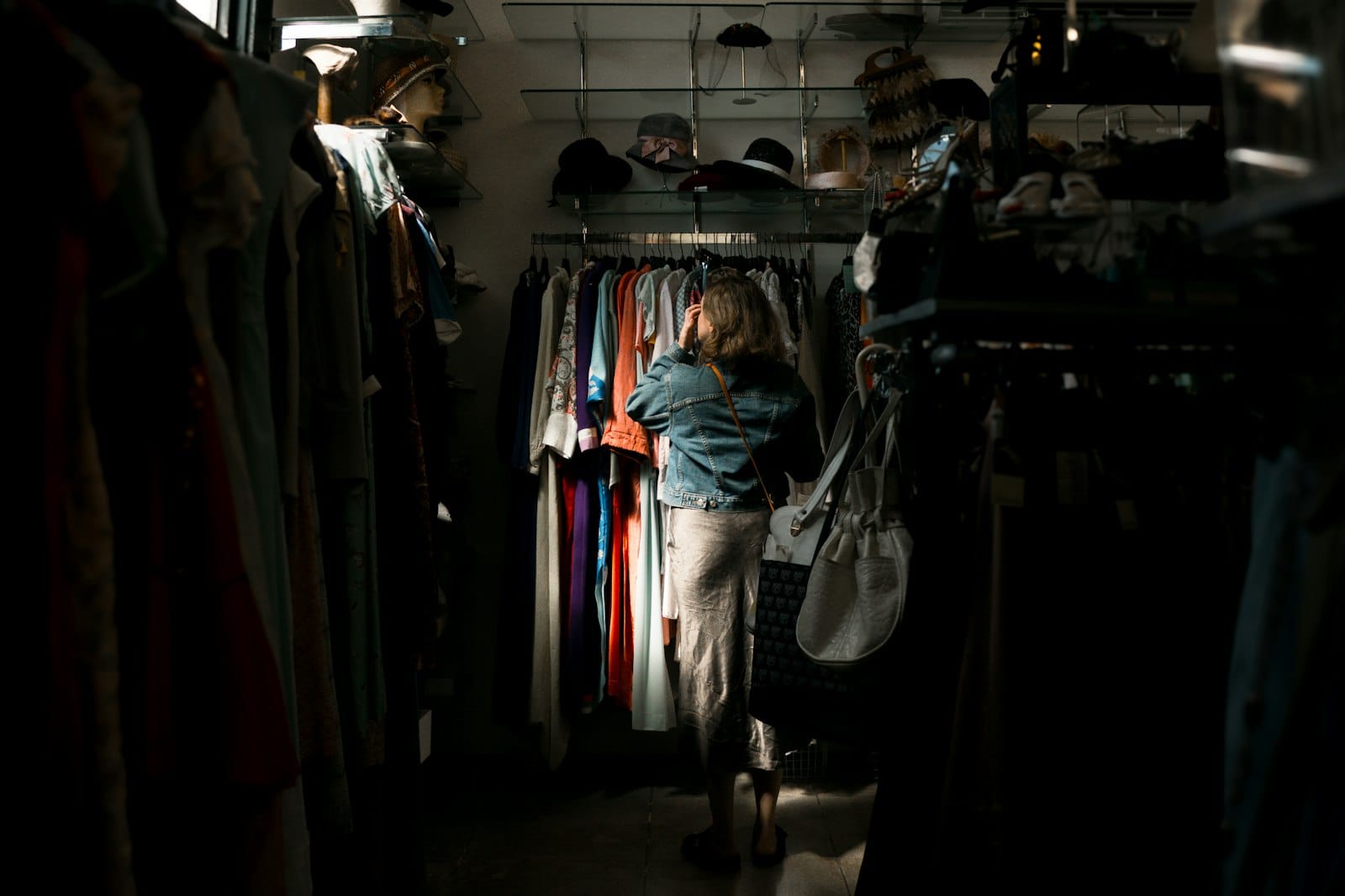 Woman browsing racks in a boutique