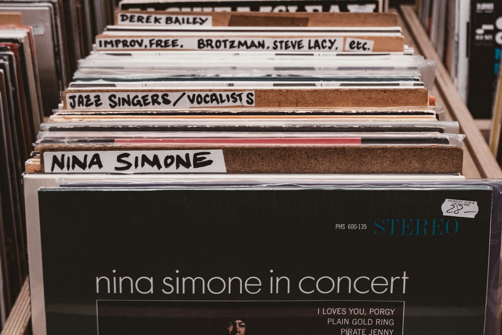 A Nina Simone vinyl facing out in a bin with handwritten jazz divider tabs
