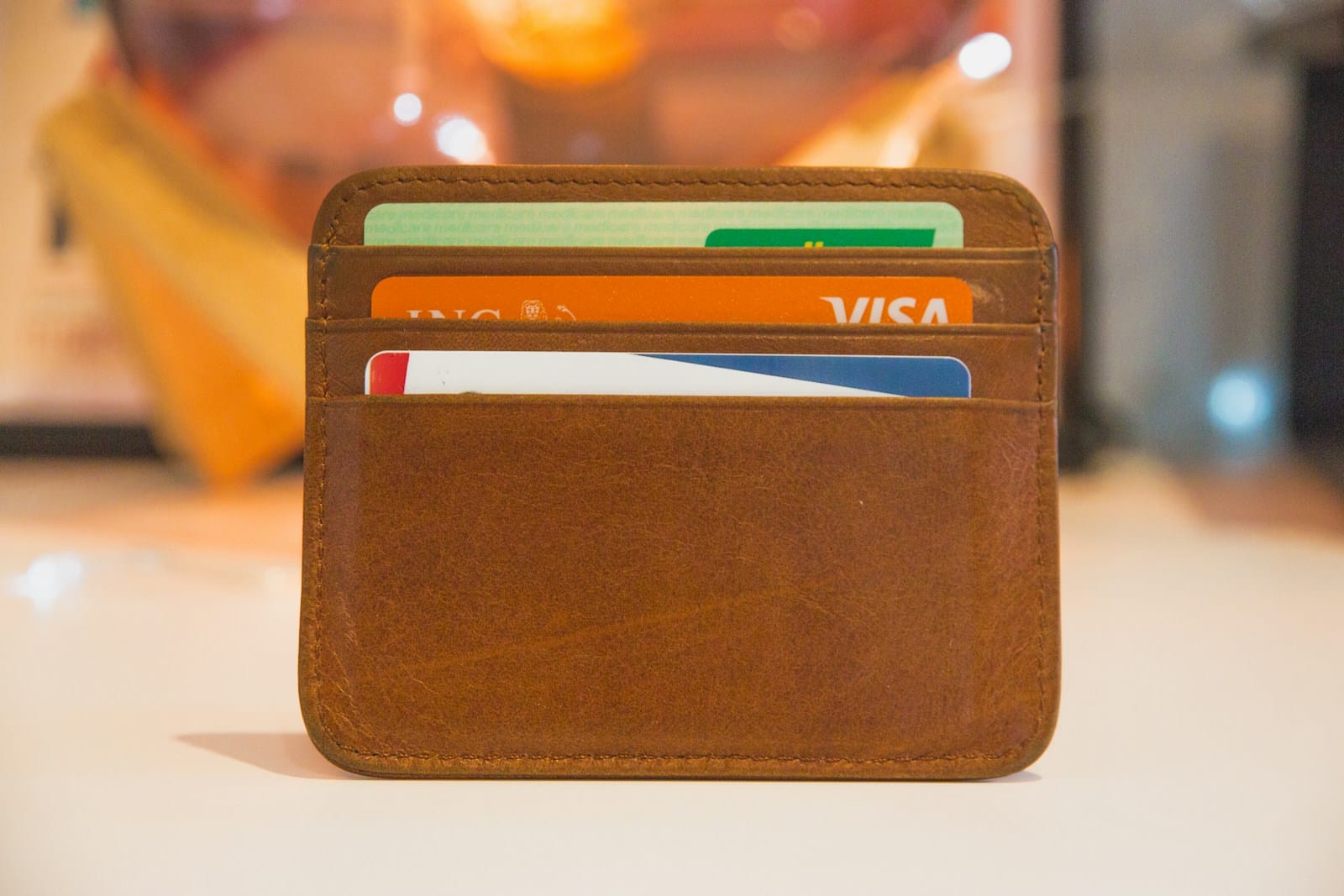 Brown leather cardholder wallet with cards